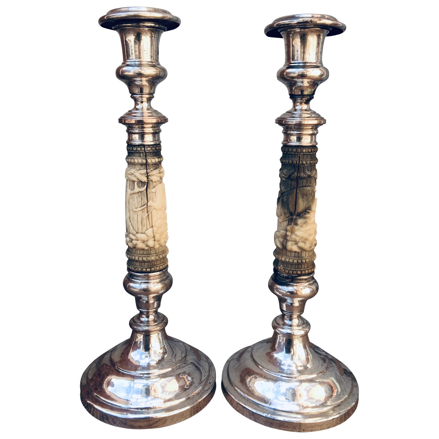 French 19th century pair of carved antler and silver platted copper candlesticks.