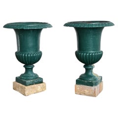 French 19th Century Pair of Cast Iron Urns on Stone Bases