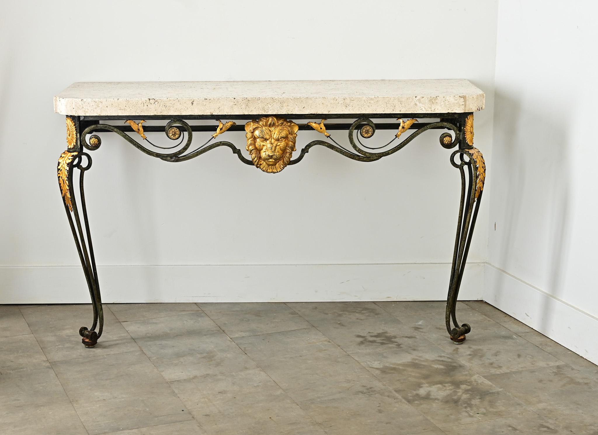 A French 19th century transitional wrought iron console with thick limestone top and parcel gilt decoration around the table frame to make an arresting statement in a foyer or entryway. The piece reflects several historic styles from Louis XV to