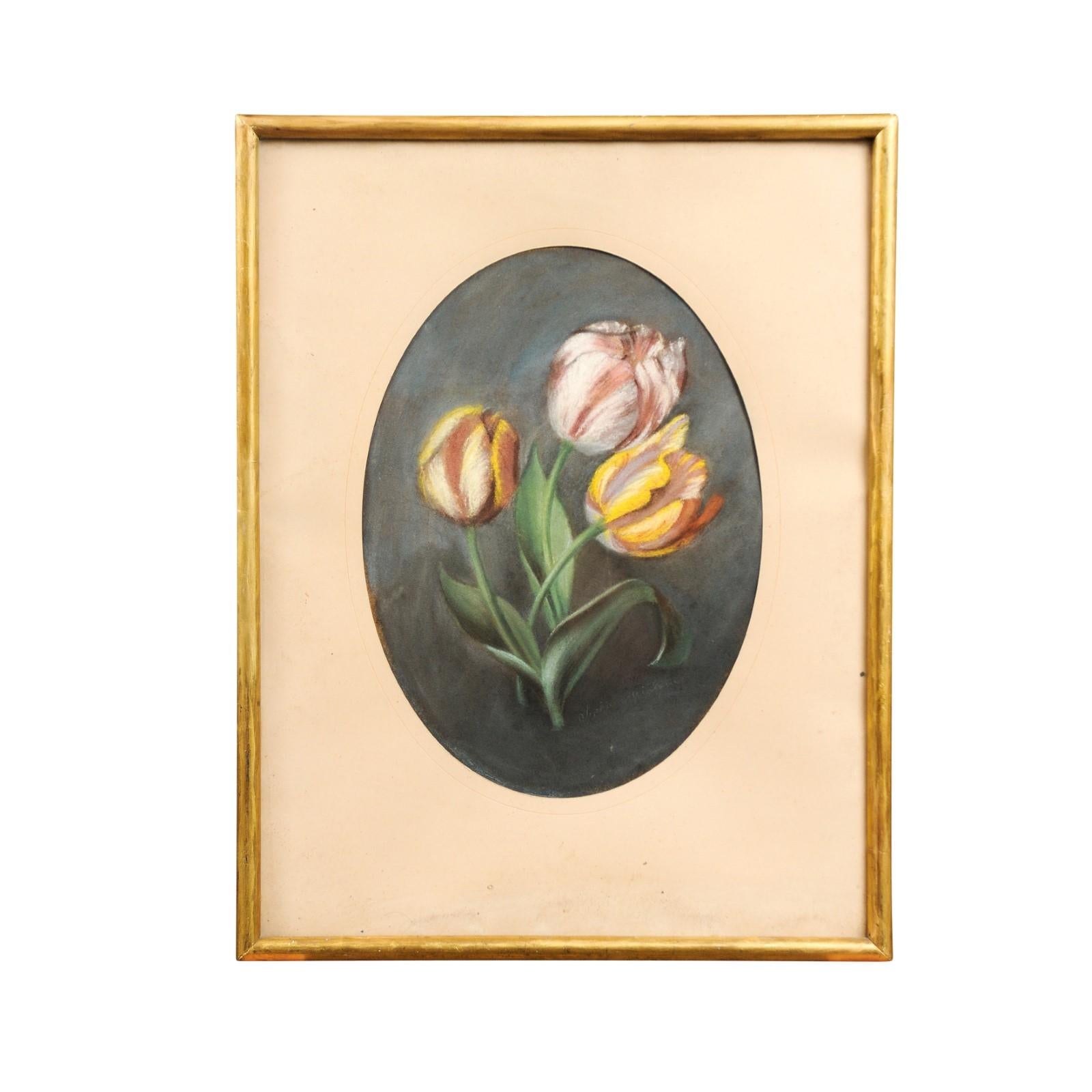 A French pastel still-life painting from the 19th century depicting a bouquet of tulips on grey background, in gilded frame. A lovely French pastel still-life painting from the 19th century, depicting a vibrant bouquet of tulips against a dark grey