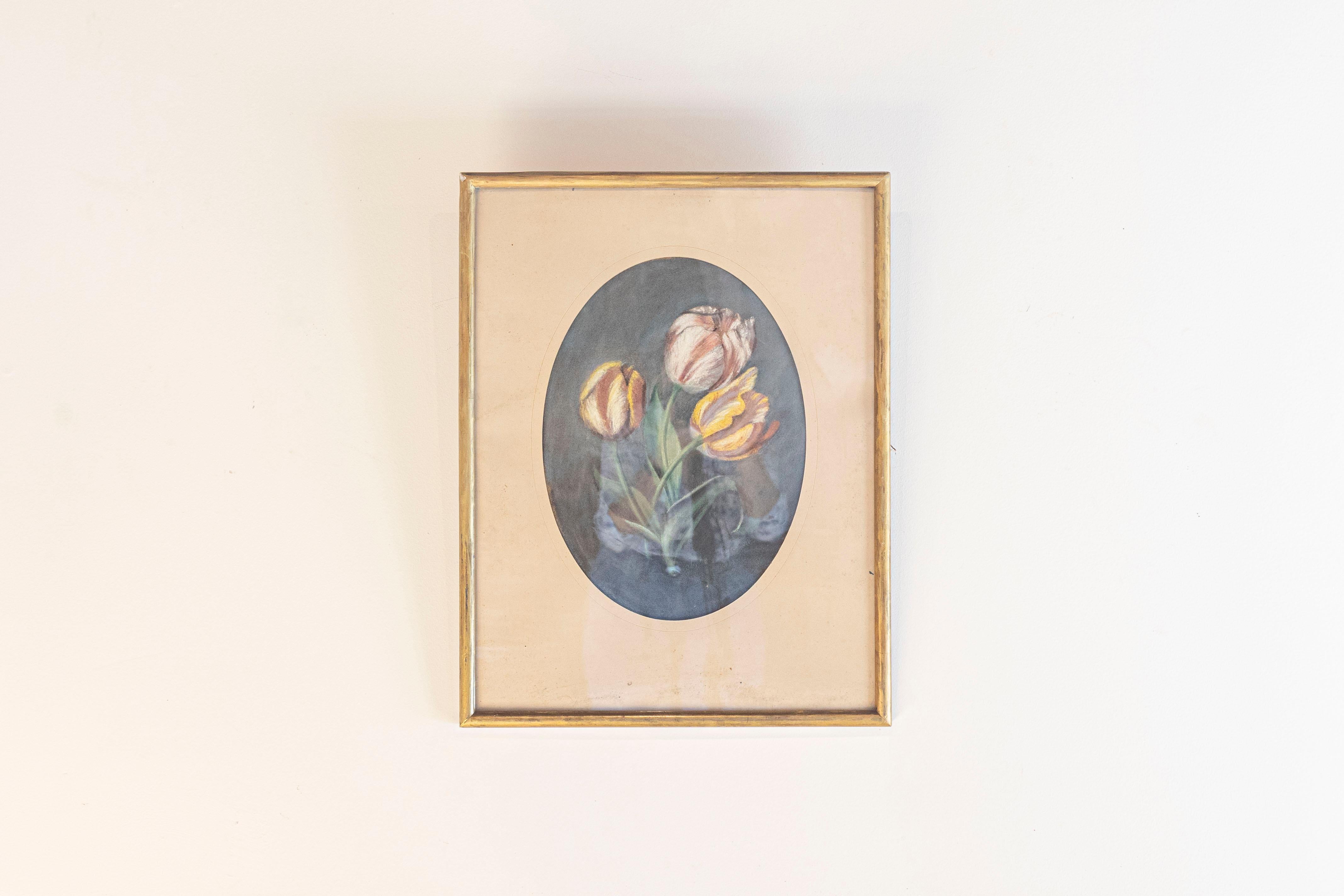 A French pastel still-life painting from the 19th century depicting a bouquet of tulips on grey background, in gilded frame. A lovely French pastel still-life painting from the 19th century, depicting a vibrant bouquet of tulips against a dark grey