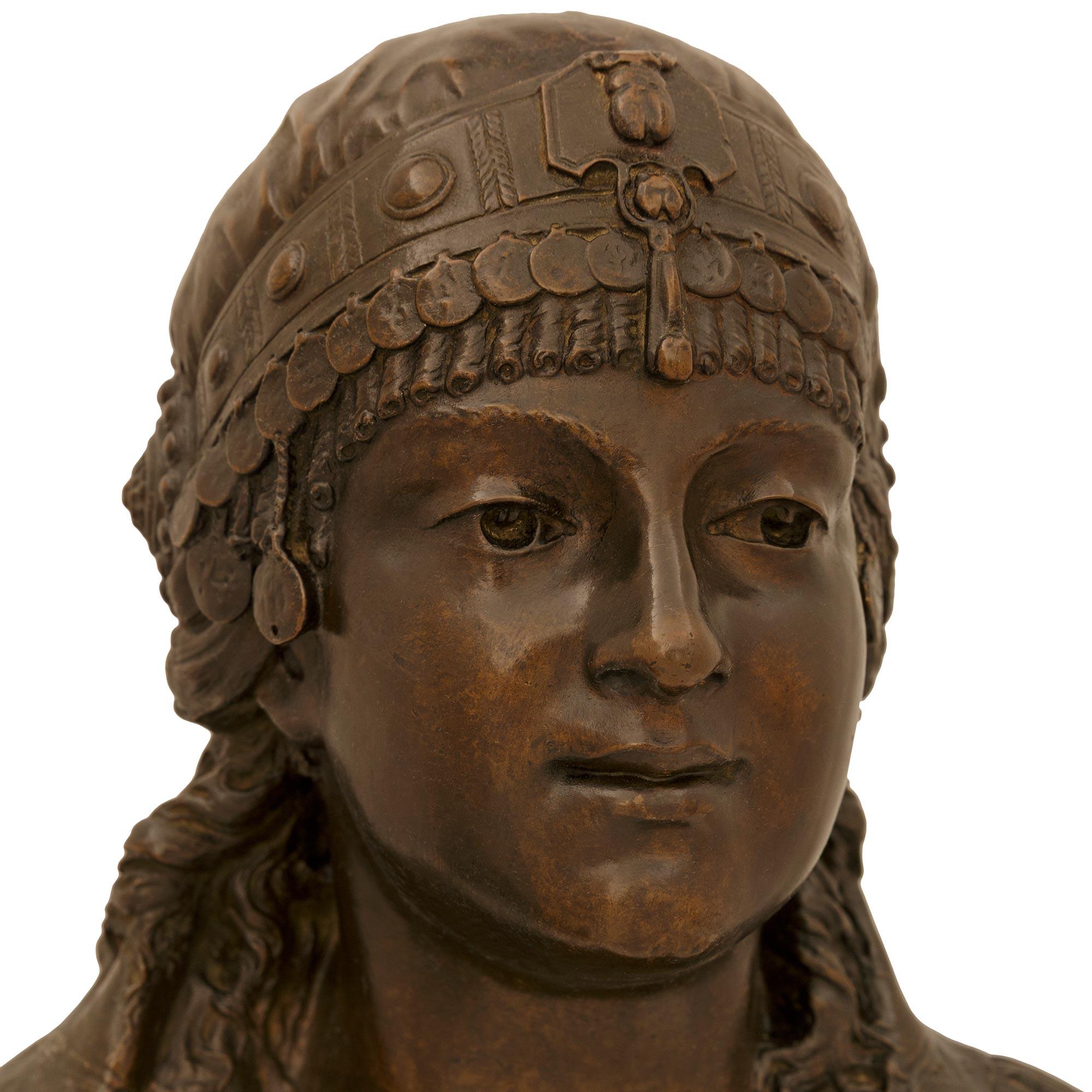 19th Century French 19th century patinated Bronze and Oak bust signed Cesar Ceribelli, Paris For Sale