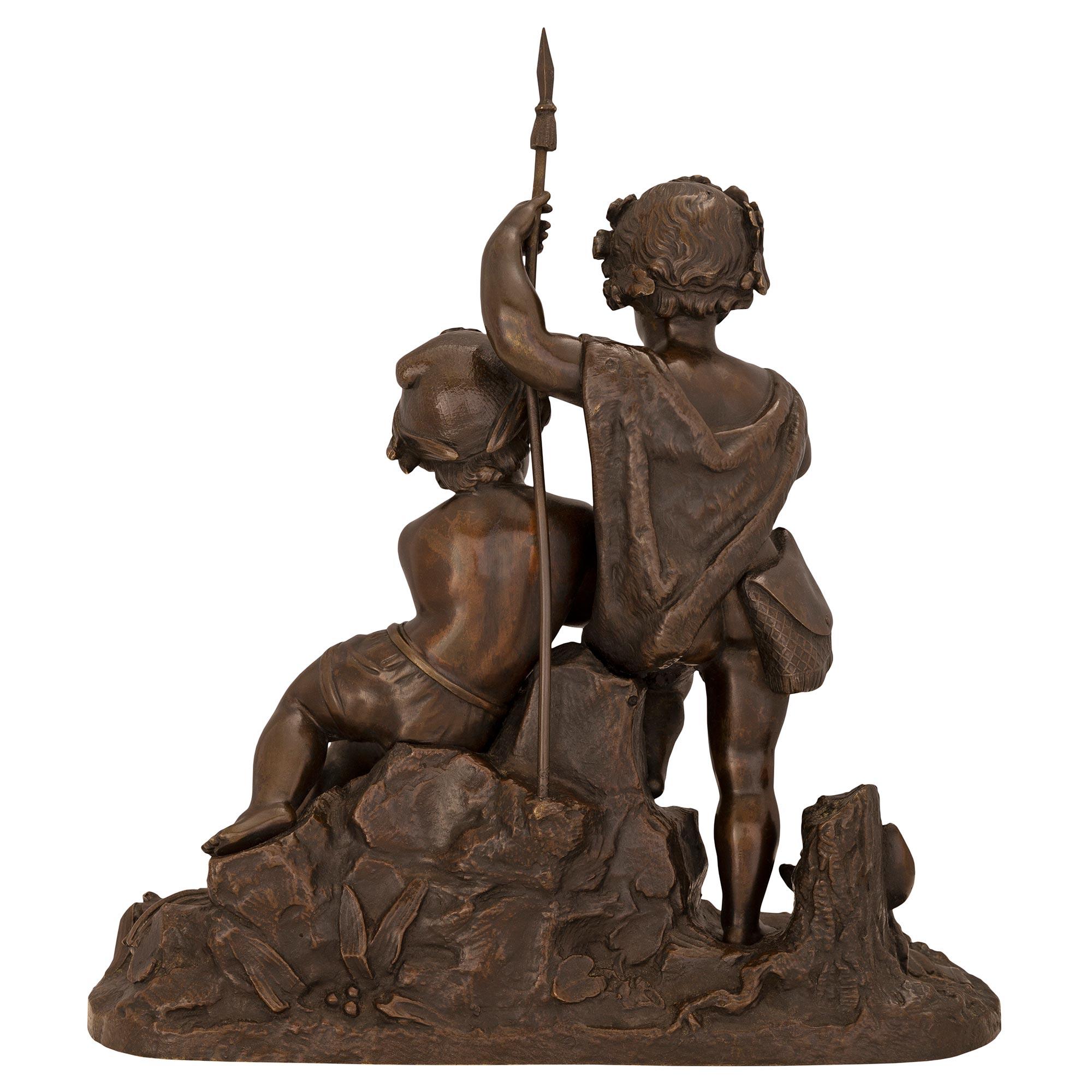 Statue française du 19ème siècle en bronze patiné représentant deux jeunes garçons pêchent en vente 2