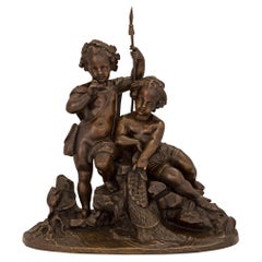 Statue française du 19ème siècle en bronze patiné représentant deux jeunes garçons pêchent