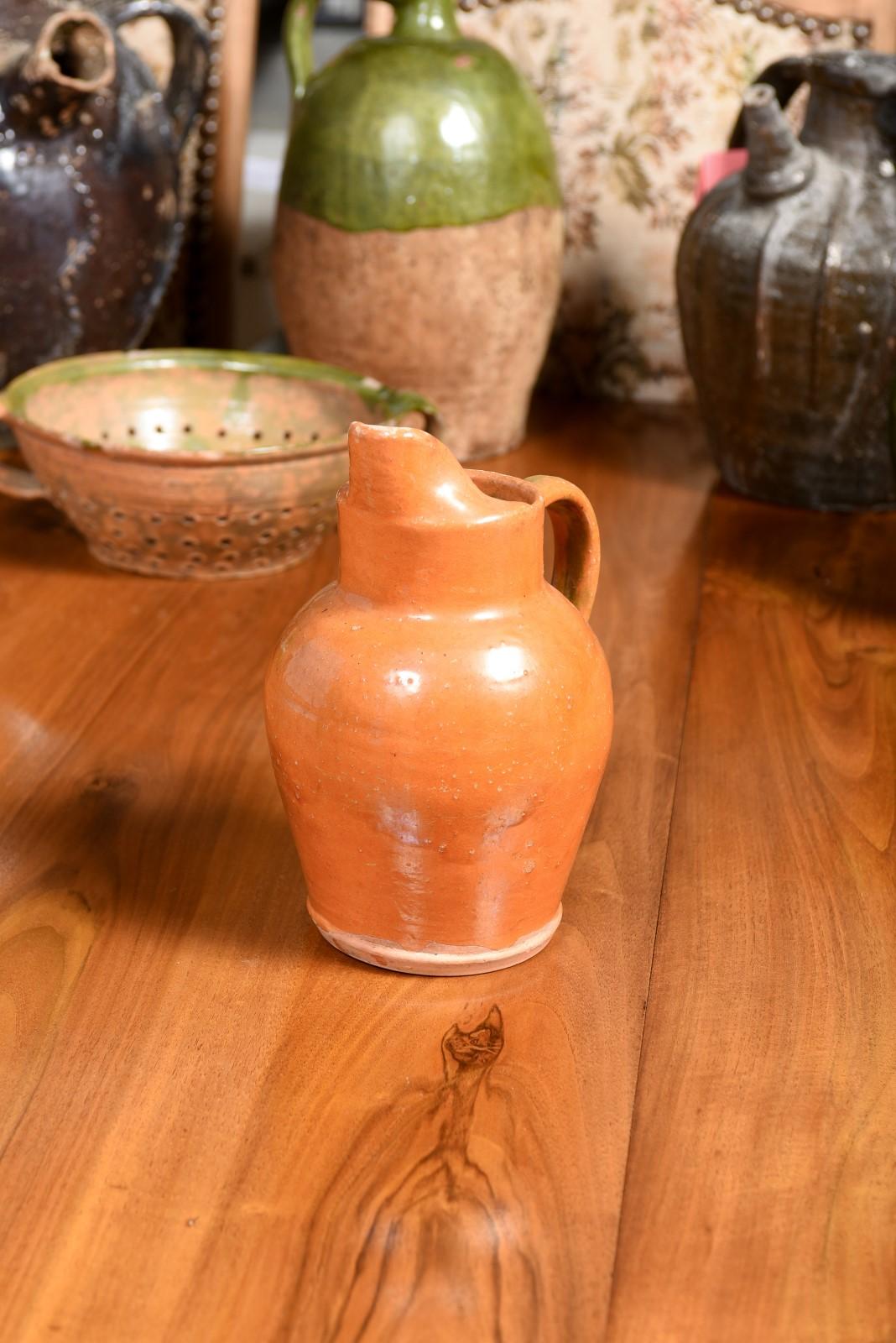 French 19th Century Pottery Jug with Orange Glaze, Back Handle and Front Spout 6