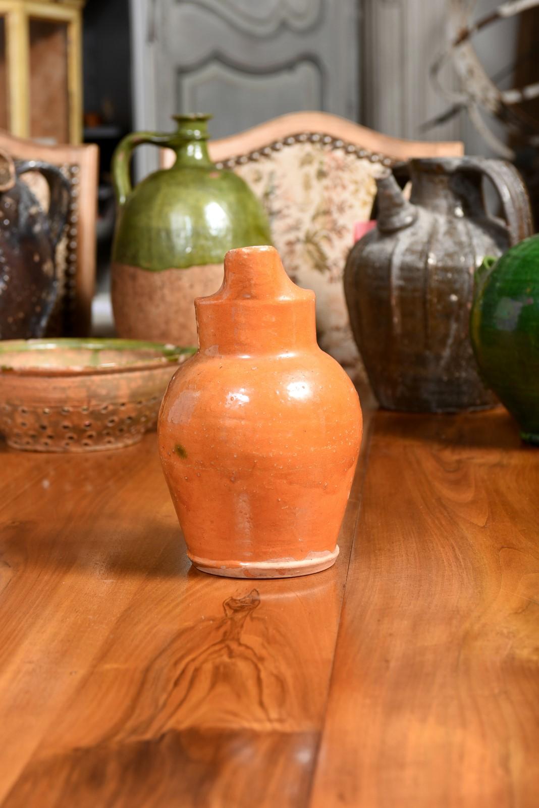 French 19th Century Pottery Jug with Orange Glaze, Back Handle and Front Spout 7