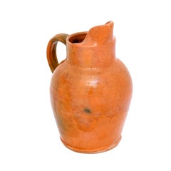 French 19th Century Pottery Jug with Orange Glaze, Back Handle and Front Spout