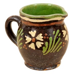 French 19th Century Pottery Pitcher with Brown and Green Glaze and White Flowers