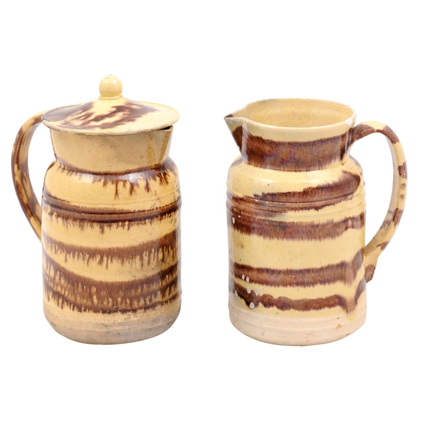 French 19th Century Pottery Pitcher with Cream and Brown Glaze with Dripping For Sale