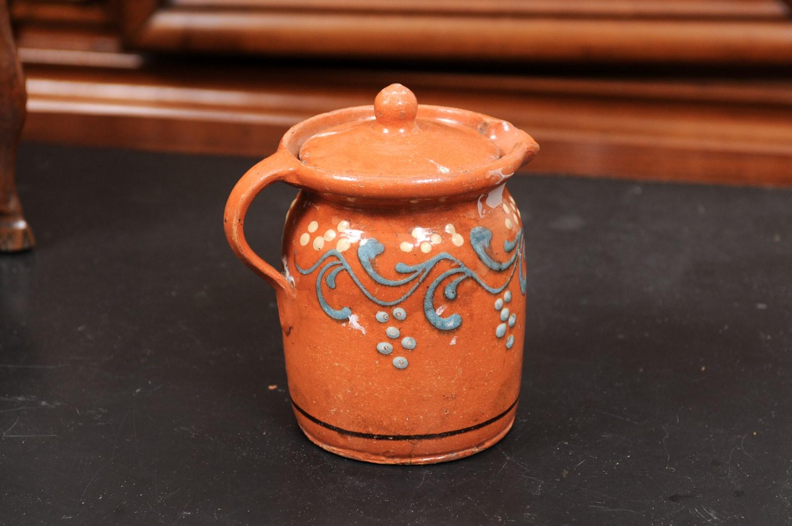 French 19th Century Pottery Pitcher with Orange and Blue Glaze and Foliage Motif In Good Condition For Sale In Atlanta, GA