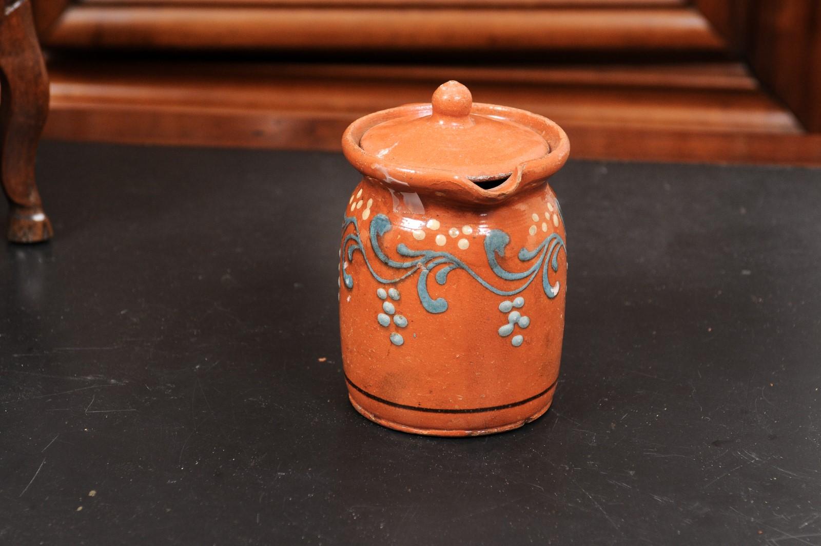 French 19th Century Pottery Pitcher with Orange and Blue Glaze and Foliage Motif For Sale 4