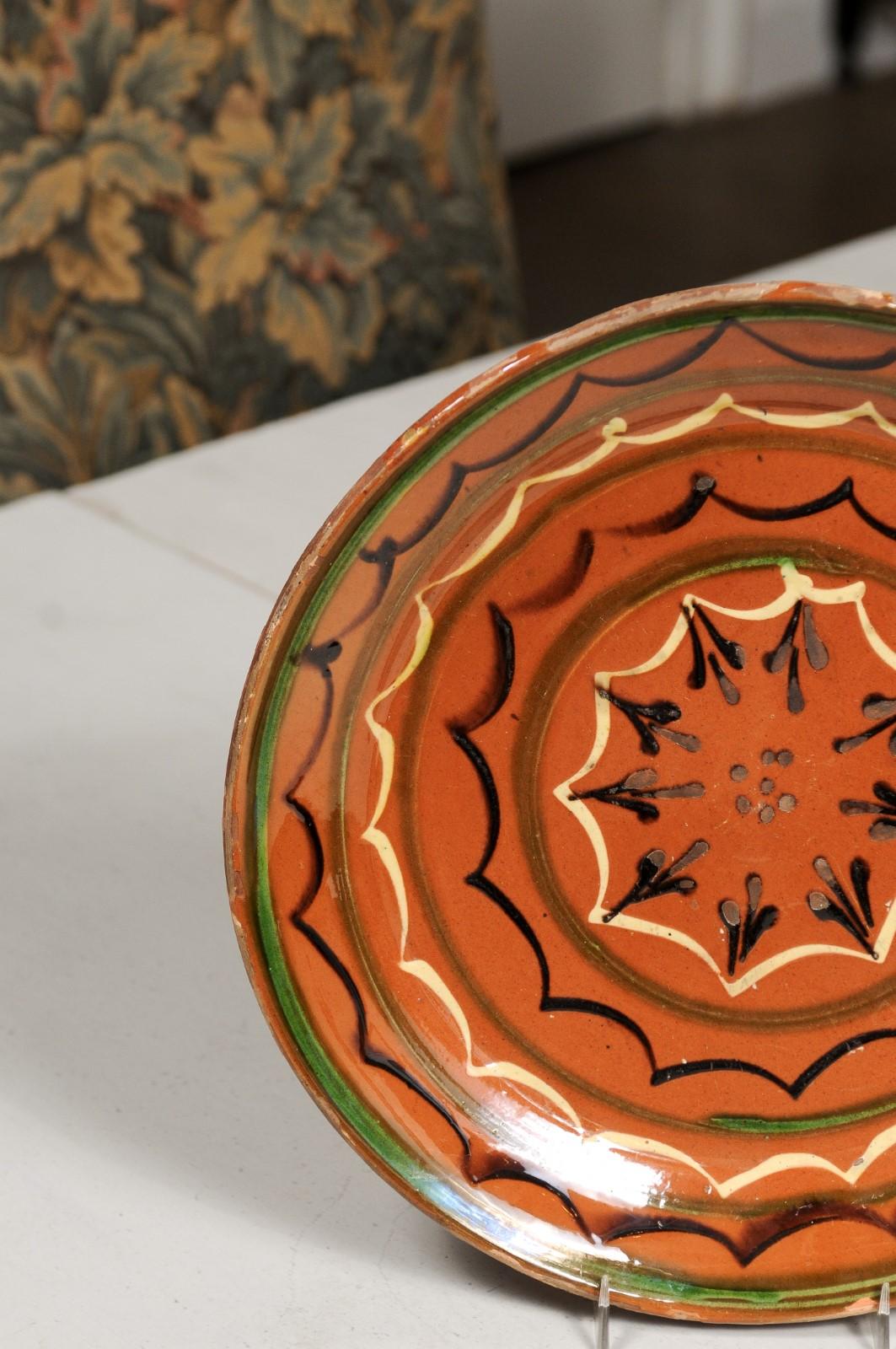 French 19th Century Pottery Plate with Rust Glaze, Black, Green and Cream Motifs 7