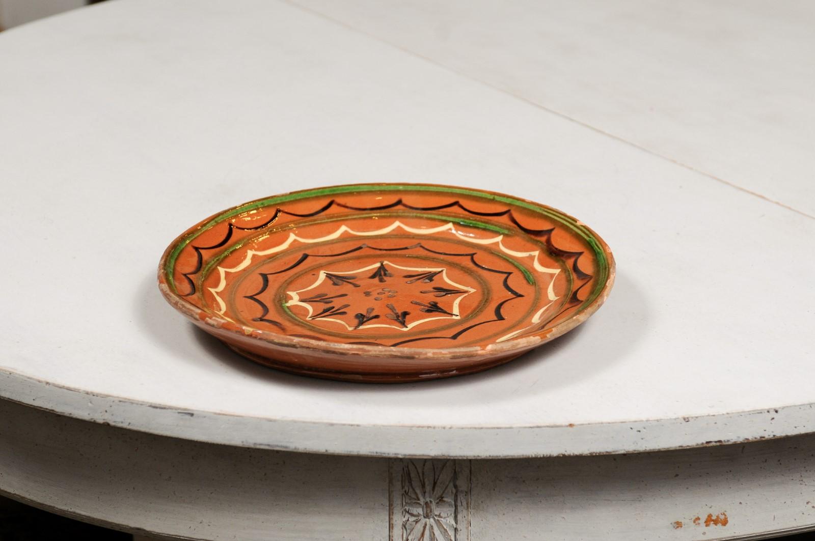 French 19th Century Pottery Plate with Rust Glaze, Black, Green and Cream Motifs 1