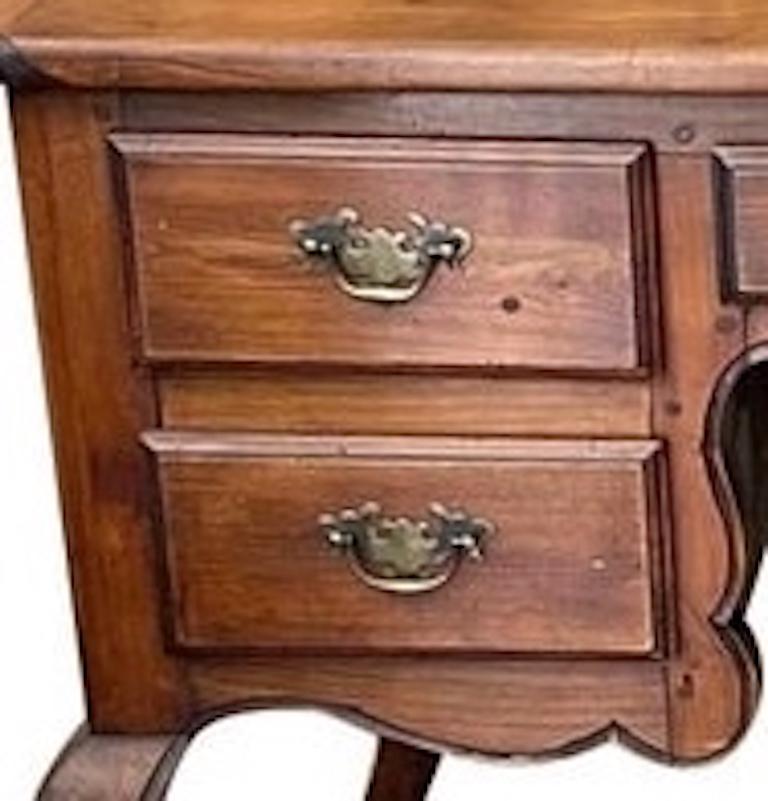 French 19th Century Provençal Hand-Carved Walnut Knee Hole Desk with 5 Drawers In Distressed Condition For Sale In Santa Monica, CA