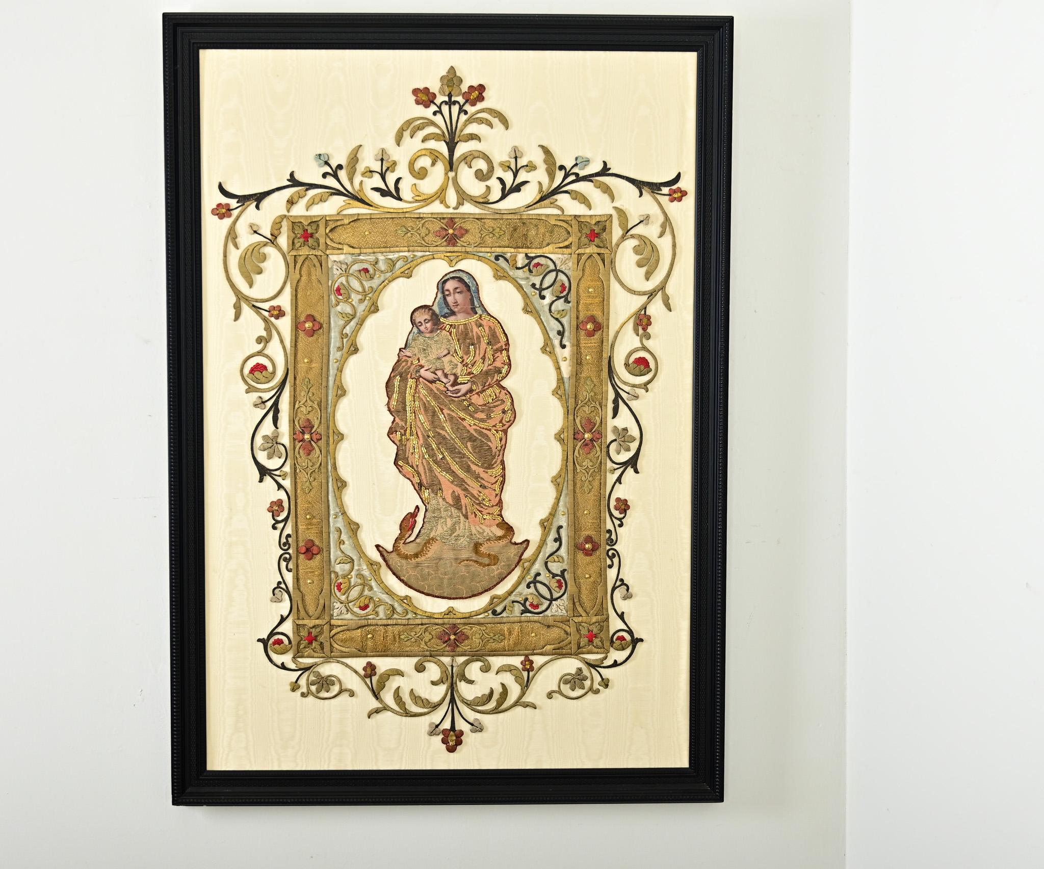 An impressive work of textile art, this French 19th century raised gold embroidery of the Madonna & Child resembles liturgical vestments such as a cope or chasuble that a member of the clergy would wear to mass, applying the same techniques and