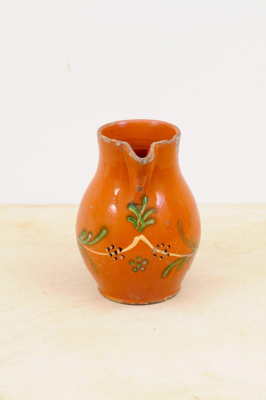 French 19th Century Redware Floral Pitcher with Orange, Cream and Green Glaze For Sale 2