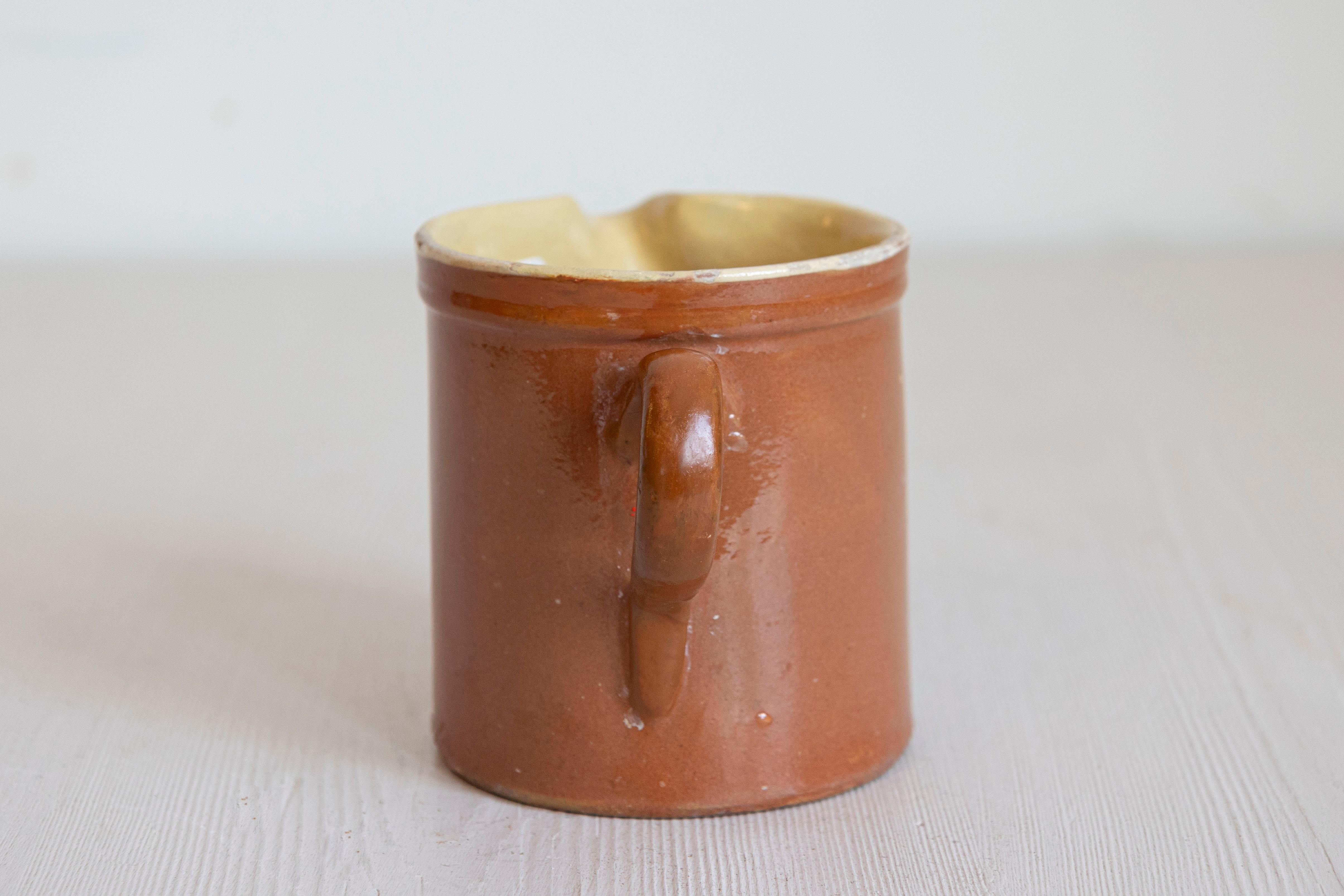 French 19th Century Redware Pitcher with White Flower Decor In Good Condition For Sale In Atlanta, GA