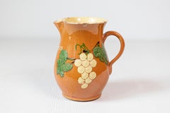 French 19th Century Redware Wine Pitcher with Orange, Cream and Green Glaze