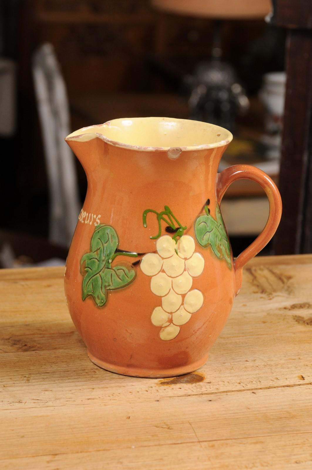 Pottery French 19th Century Redware Wine Pitcher with Orange, Cream and Green Glaze For Sale