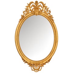 Miroir français en bois doré de style Régence du XIXe siècle