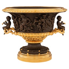 Antique French 19th century Renaissance st. patinated Bronze and Ormolu centerpiece/urn