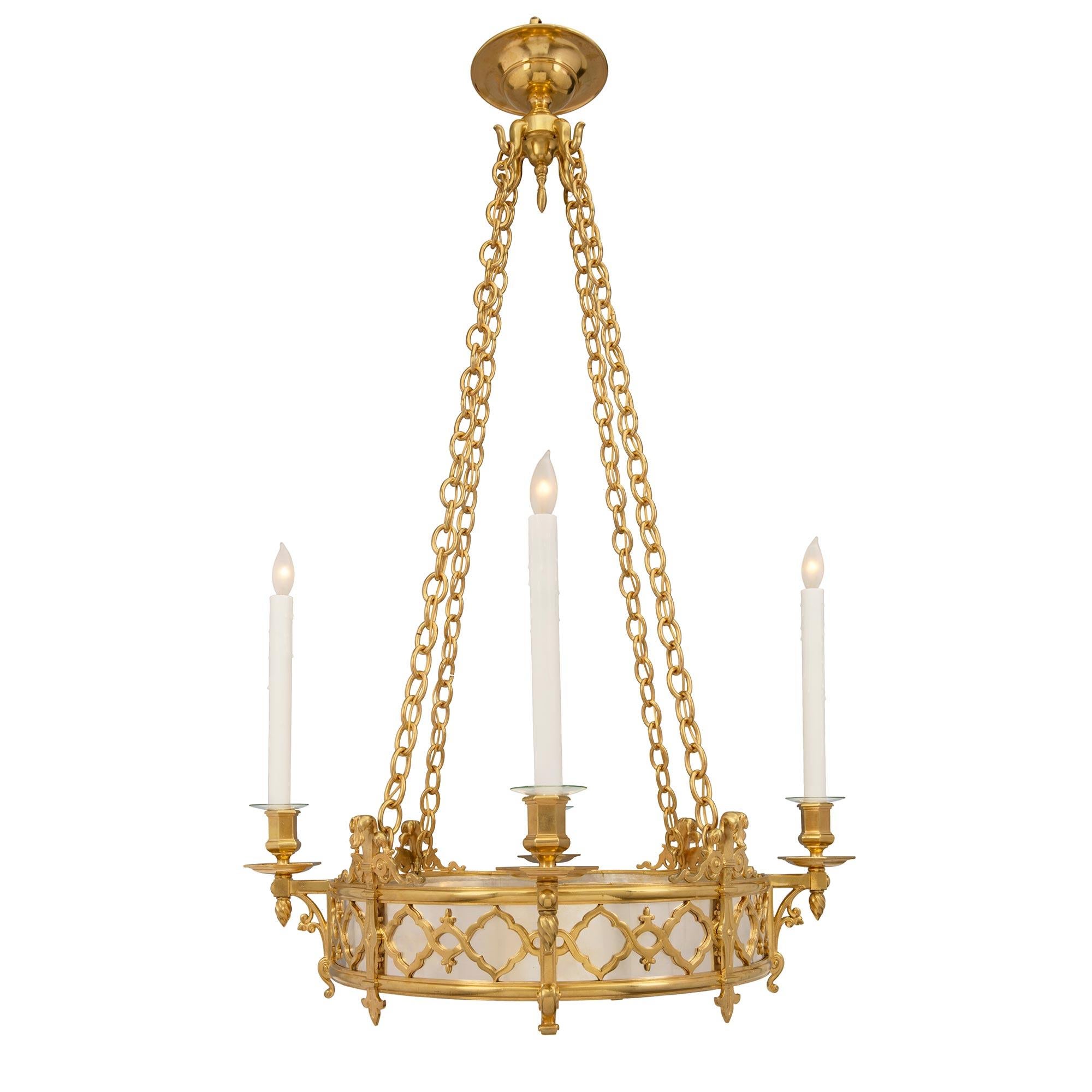A striking French 19th century Renaissance st. four arm, ten light, ormolu, silvered bronze and frosted glass chandelier. The chandelier is centered by a striking circular fitted frosted glass bottom with beautiful and most decorative etched star