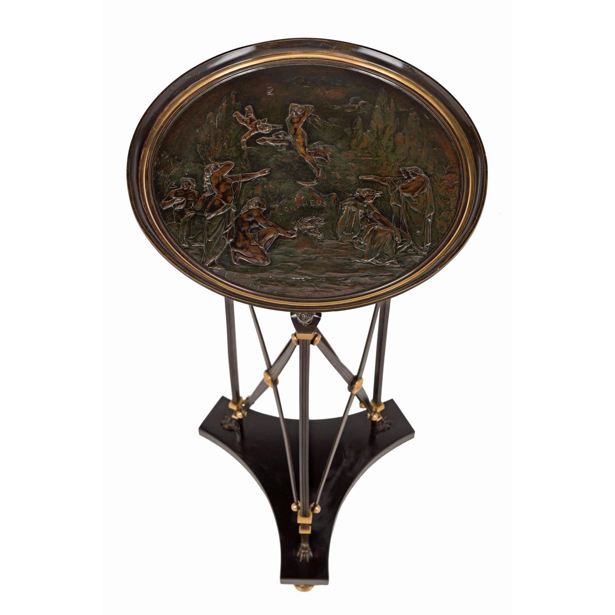 A very handsome French 19th century Renaissance St. patinated bronze tazza-designed side table, signed E. Picault, Salon 1867. Raised on ormolu topie shaped feet below a triangular concave-sided black Belgian marble base. Patinated bronze supports