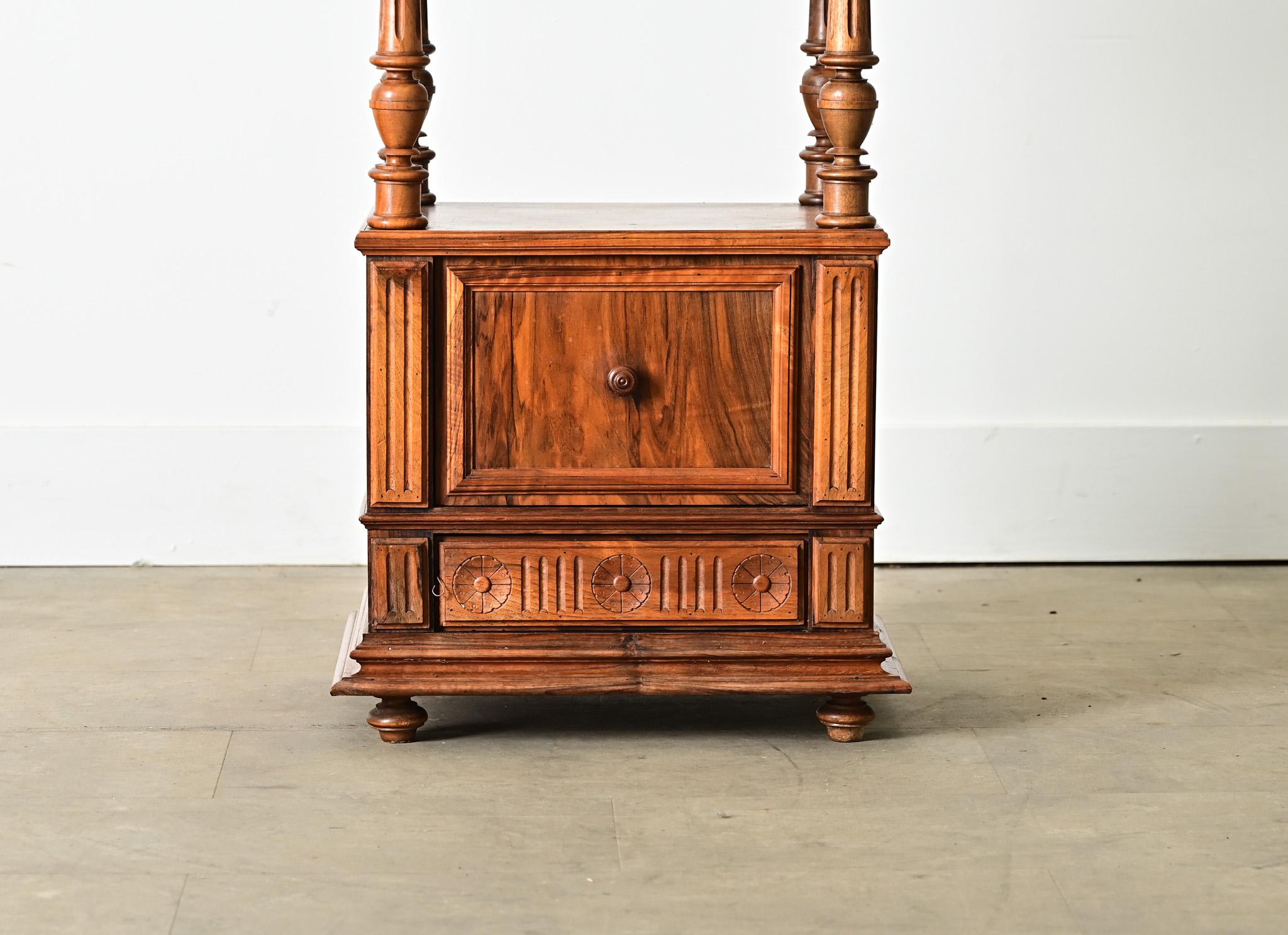 French, 19th century rosewood and red marble bedside table in a breathtaking variety of Louis XVI-inspired carving techniques that highlights the dramatic coloration and painterly striations of this covetable material. The luxurious red marble