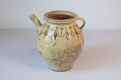 French 19th Century Rustic Glazed Pottery Olive Oil Pot with Polychrome Motifs