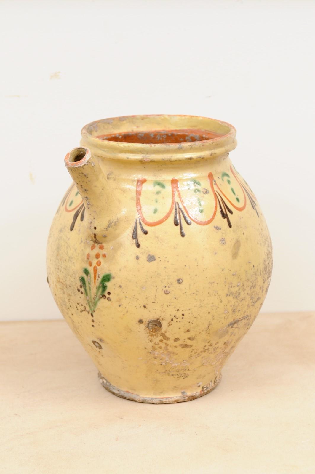 Poteries Pot à huile d'olivier en poterie émaillée rustique du 19ème siècle avec motifs polychromes en vente