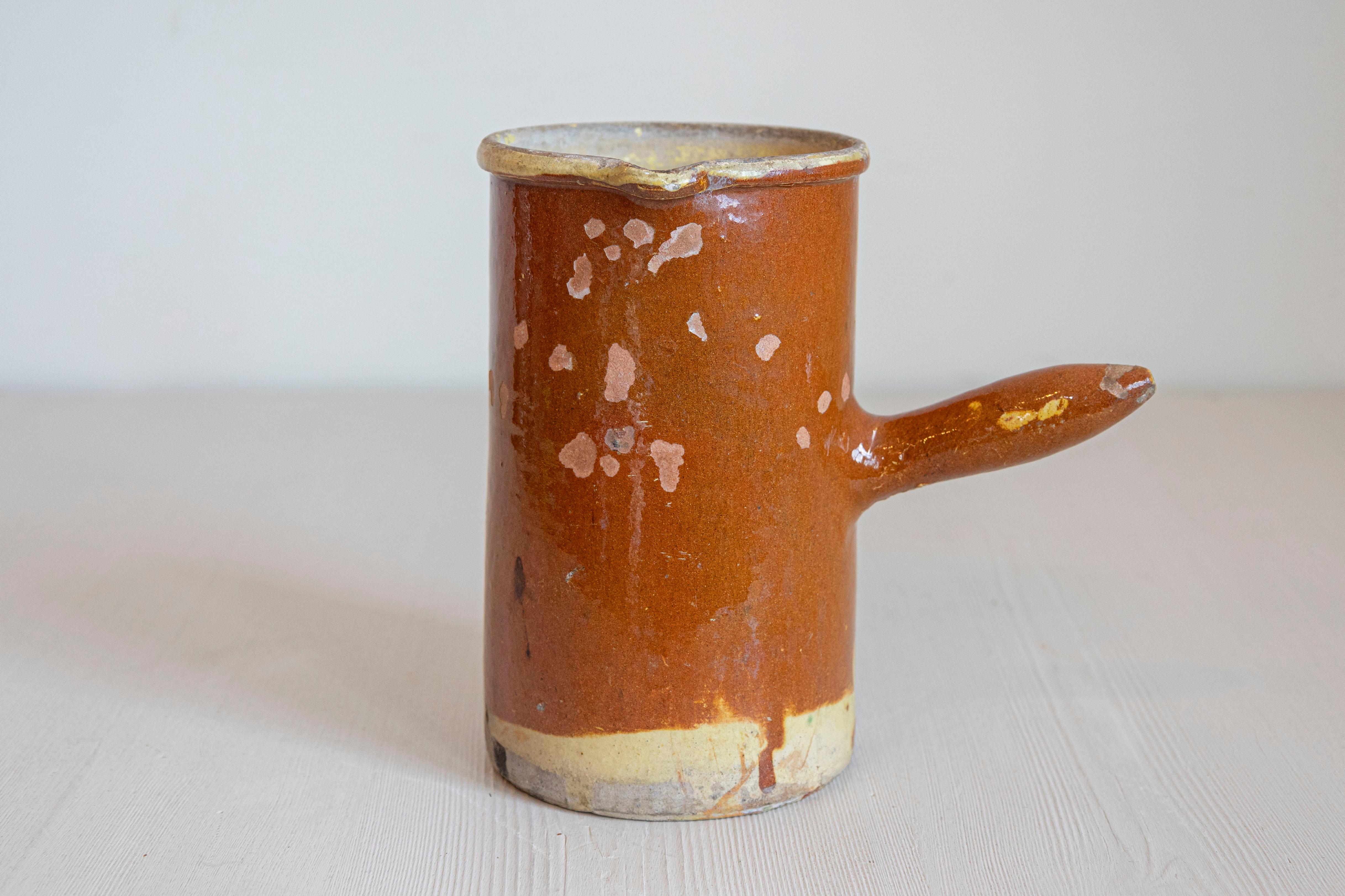 Glazed French 19th Century Rustic Pitcher with Rust Colored Glaze and Straight Handle For Sale