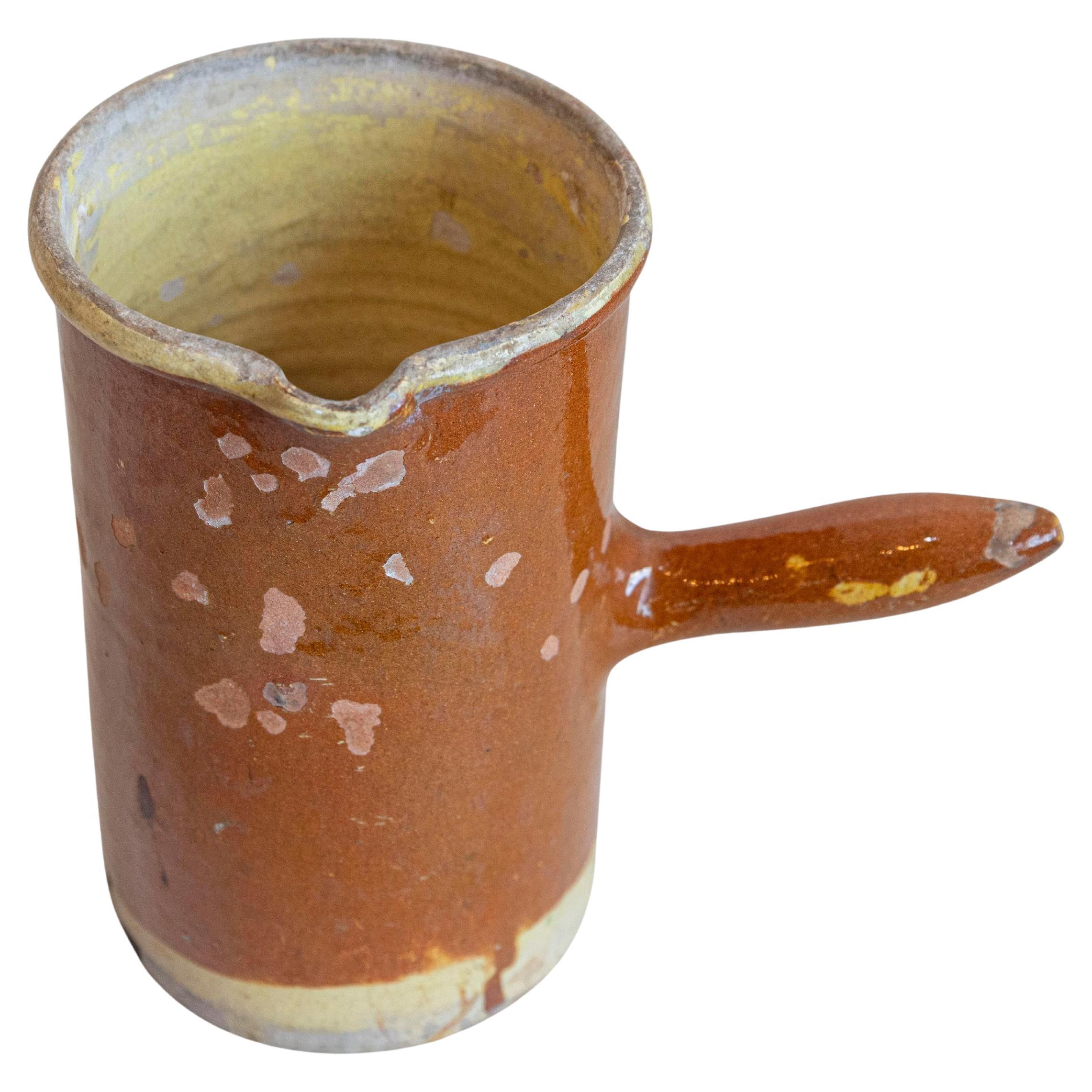 French 19th Century Rustic Pitcher with Rust Colored Glaze and Straight Handle