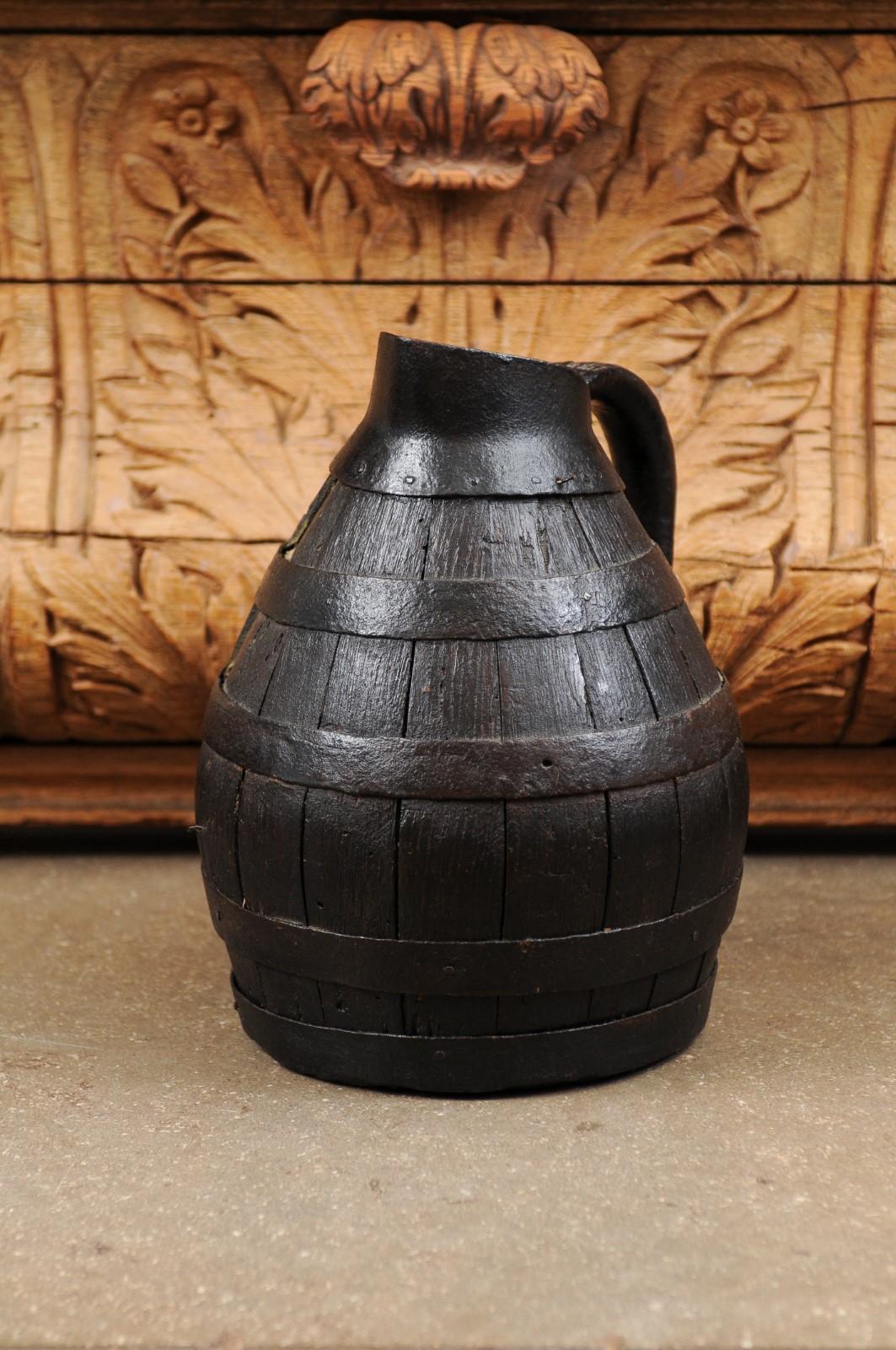 French 19th Century Rustic Wooden Wine Jug with Iron Accents and Dark Patina 7