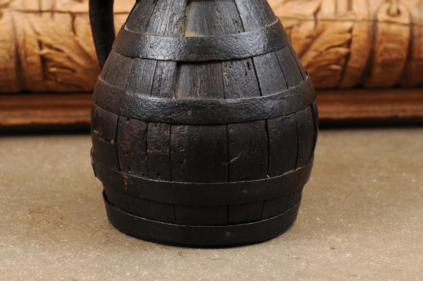 French 19th Century Rustic Wooden Wine Jug with Iron Accents and Dark Patina 1