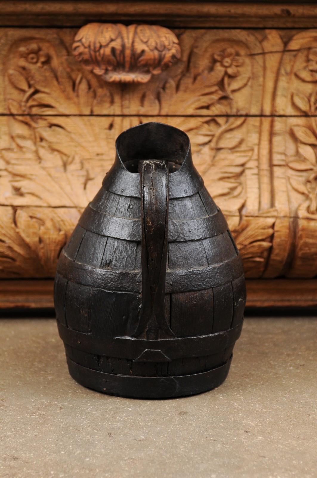 French 19th Century Rustic Wooden Wine Jug with Iron Accents and Dark Patina 4