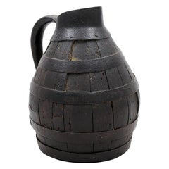 French 19th Century Rustic Wooden Wine Jug with Iron Accents and Dark Patina