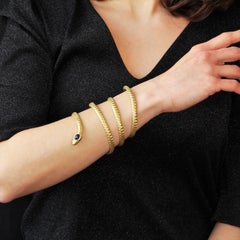 Bracciale a serpente in oro giallo 18 carati con zaffiro cabochon del XIX secolo francese