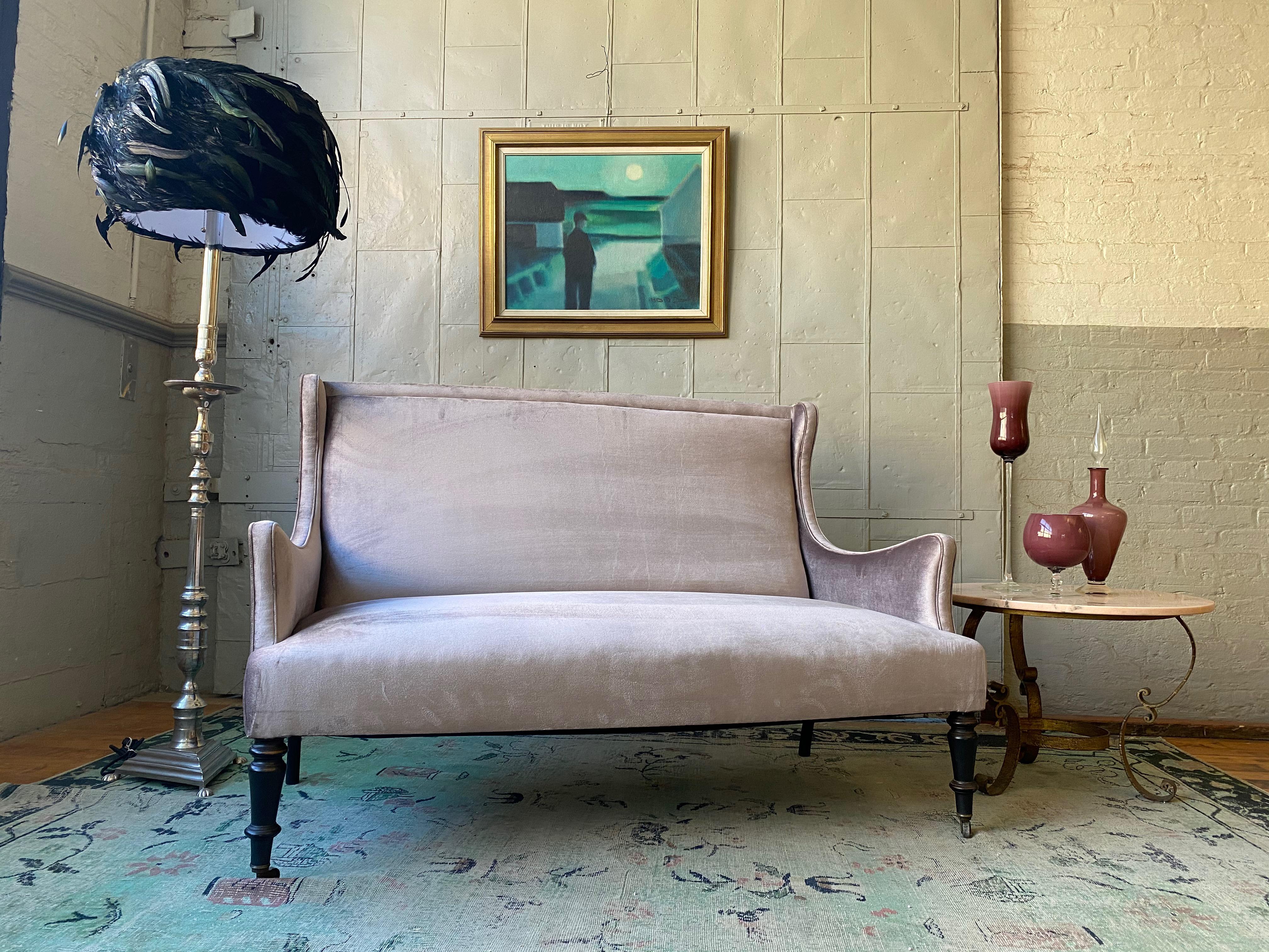 19th century French velvet upholstered settee with turned wood legs. The settee has recently been reupholstered. 

Ref #: SN0215-14 

Dimensions: 37”H x 54”W x 29”D (15”Seat Height)