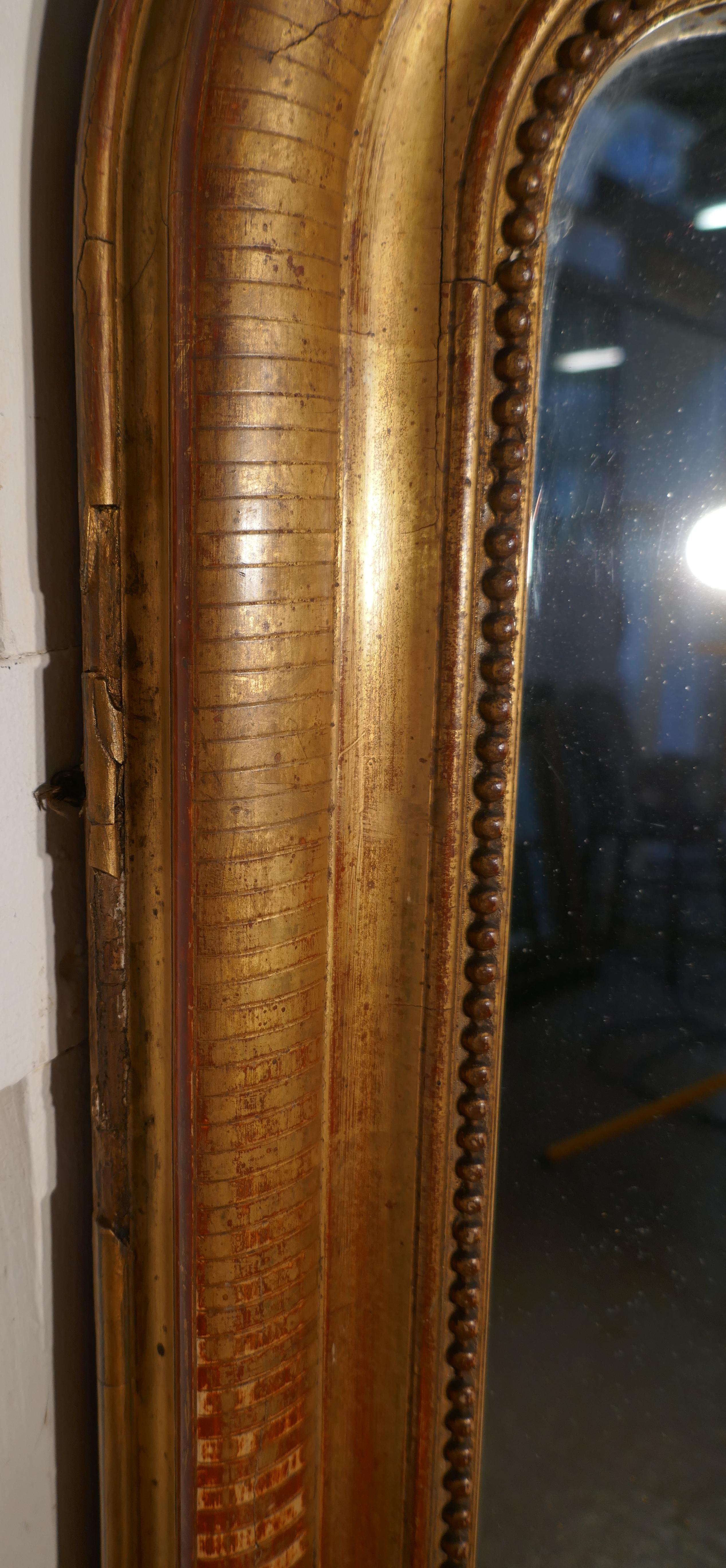 French 19th century shabby gilt Louis Philippe gold mirror

This is a charming wall mirror a genuine example of French chic furnishing, the 4” mirror frame has had a few knocks over the years so it has been given a re polish to brighten it up