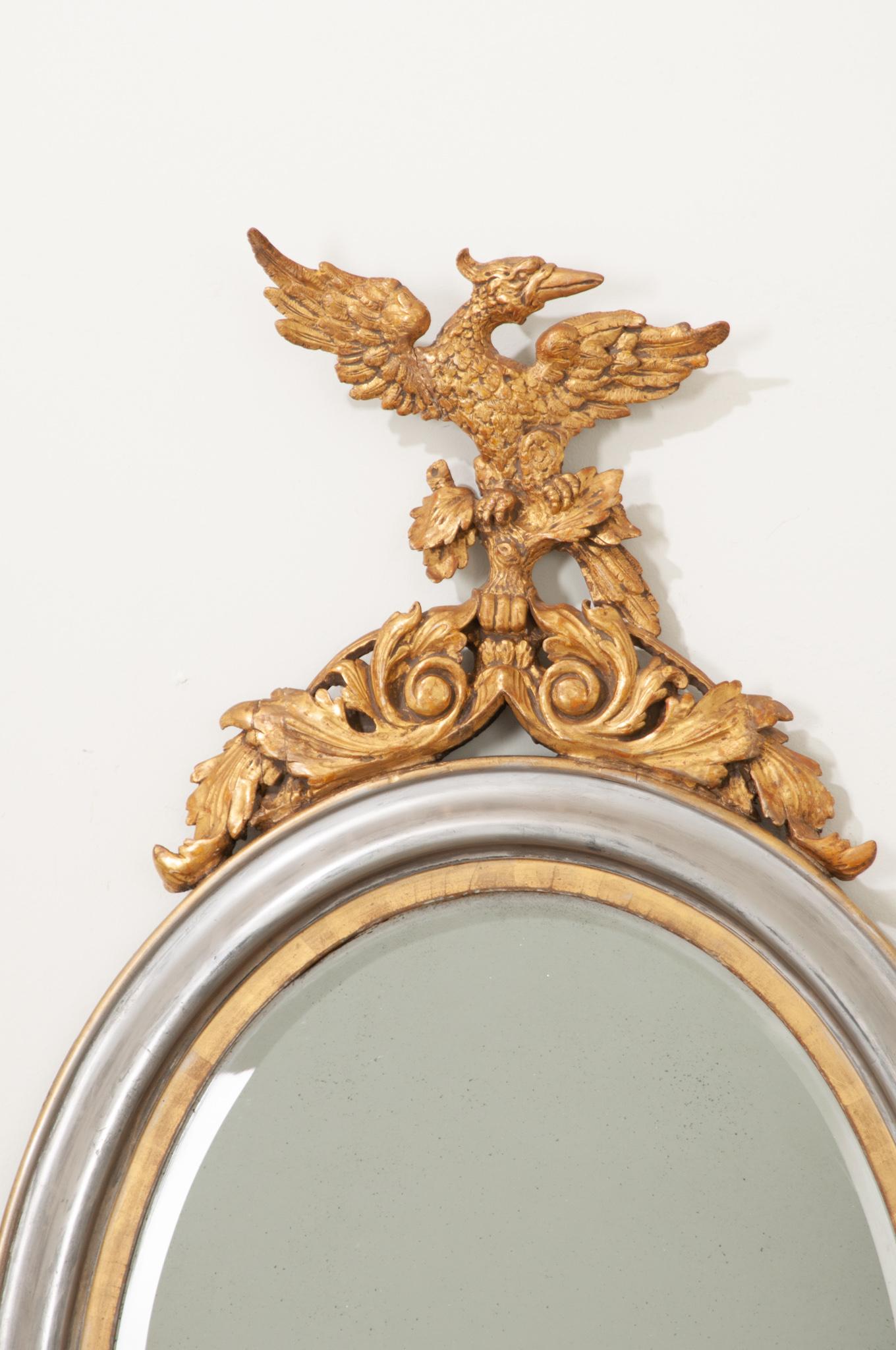 Doré Français du 19e siècle en argent et en or  Miroir ovale doré en vente