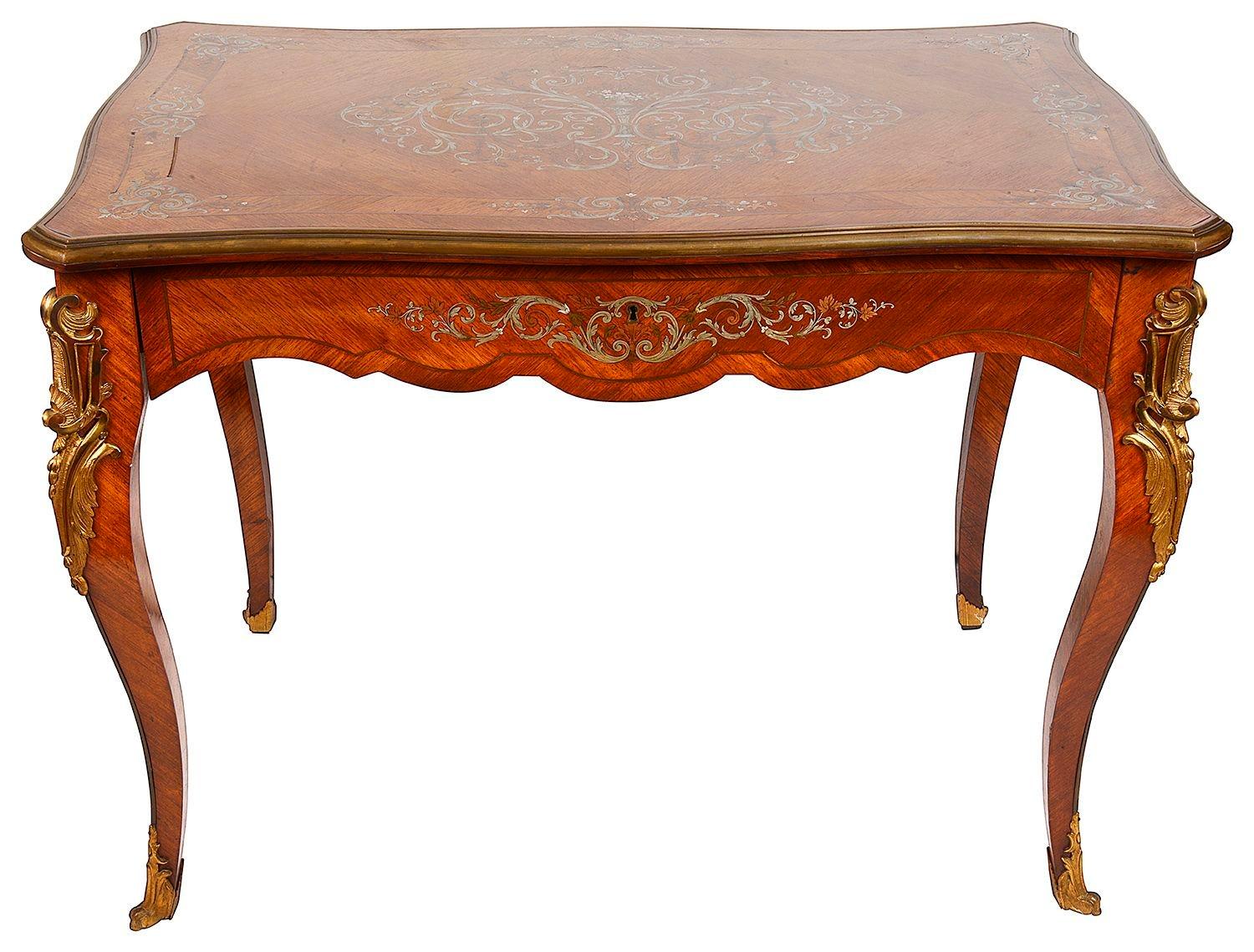 A fine quality late 19th century French Kingwood side table, having scrolling foliate silver inlaid decoration, gilded ormolu mounts, a single frieze drawer, raised on elegant cabriole legs, circa 1860-1880.
 
Batch 72/73 N/H