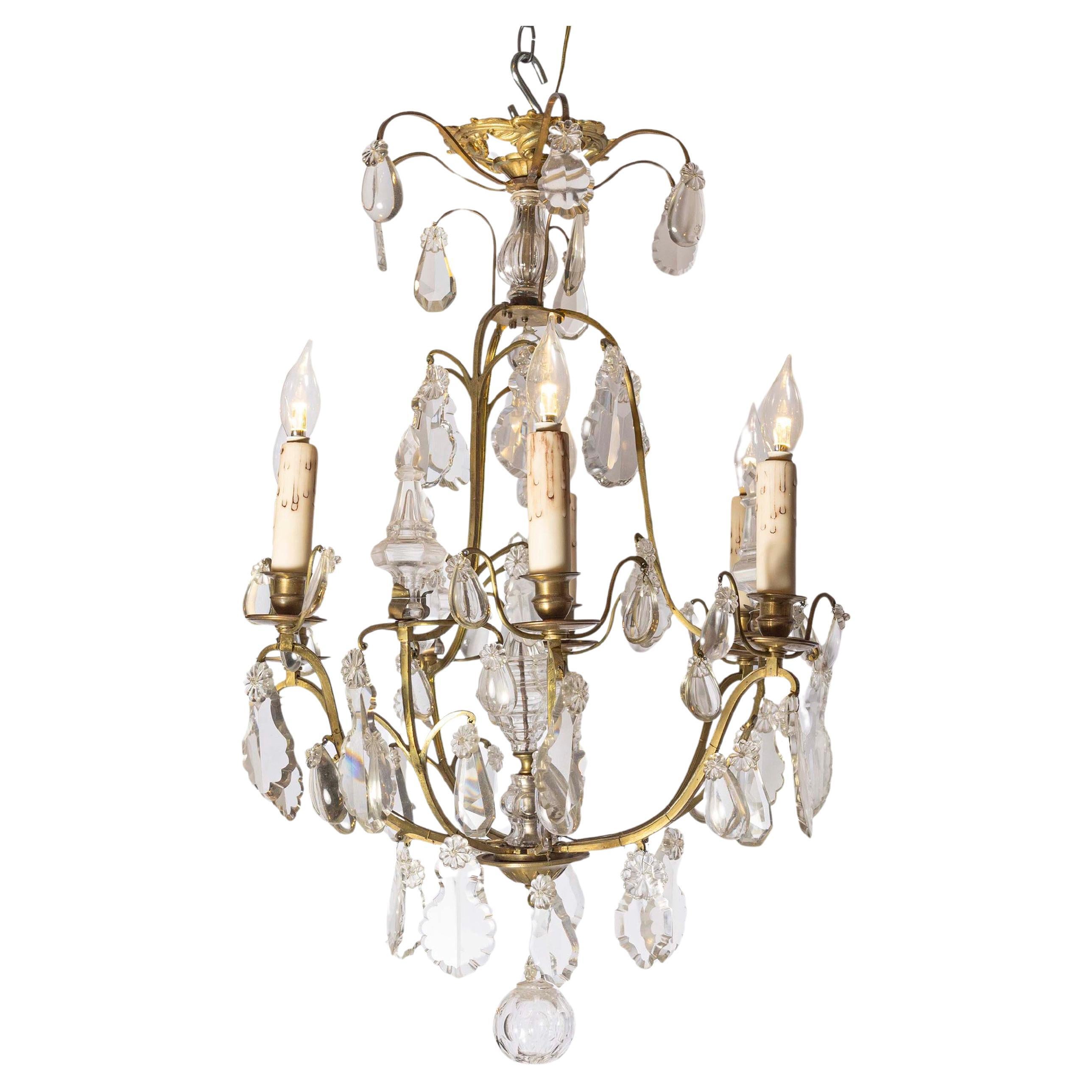 French 19th Century Six-Light Crystal Chandelier with Scrolled Brass Armature