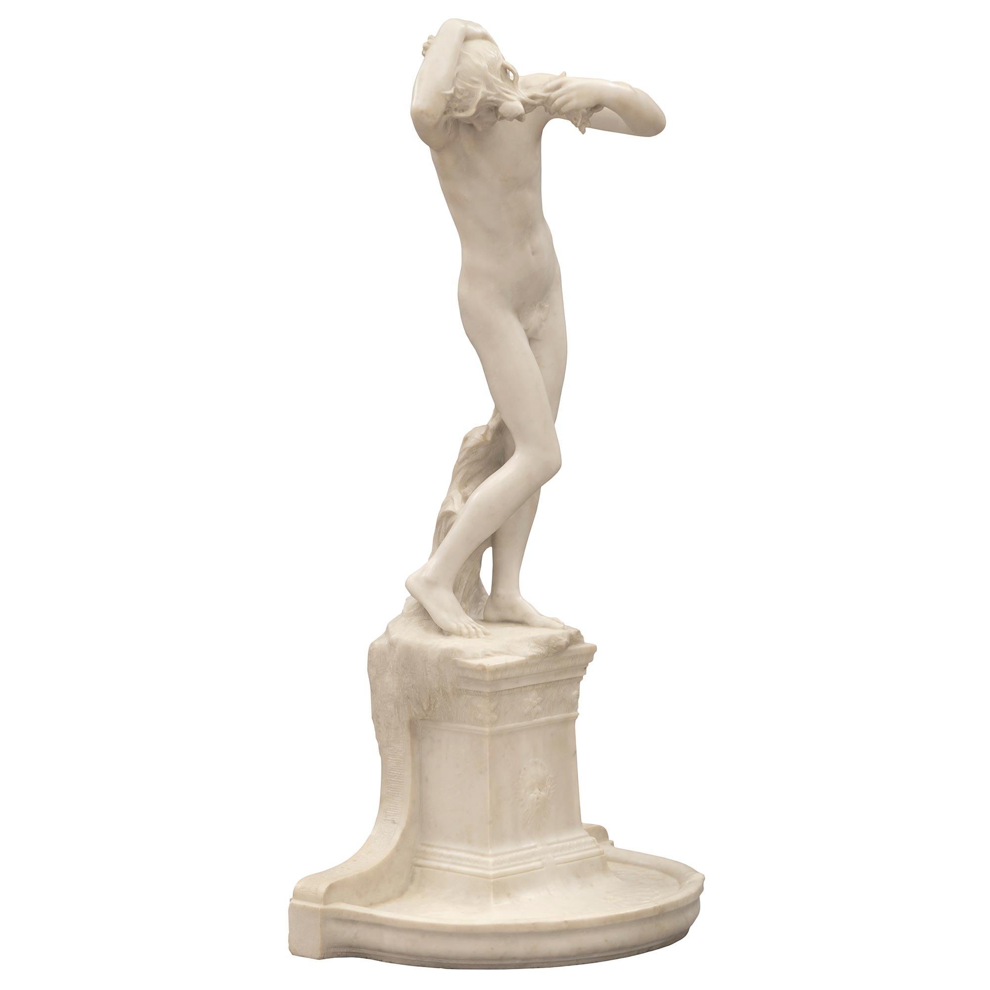 An exceptional and most elegant French 19th century solid white Carrara marble statue/basin signed Henri Leon Greber. The statue titled 