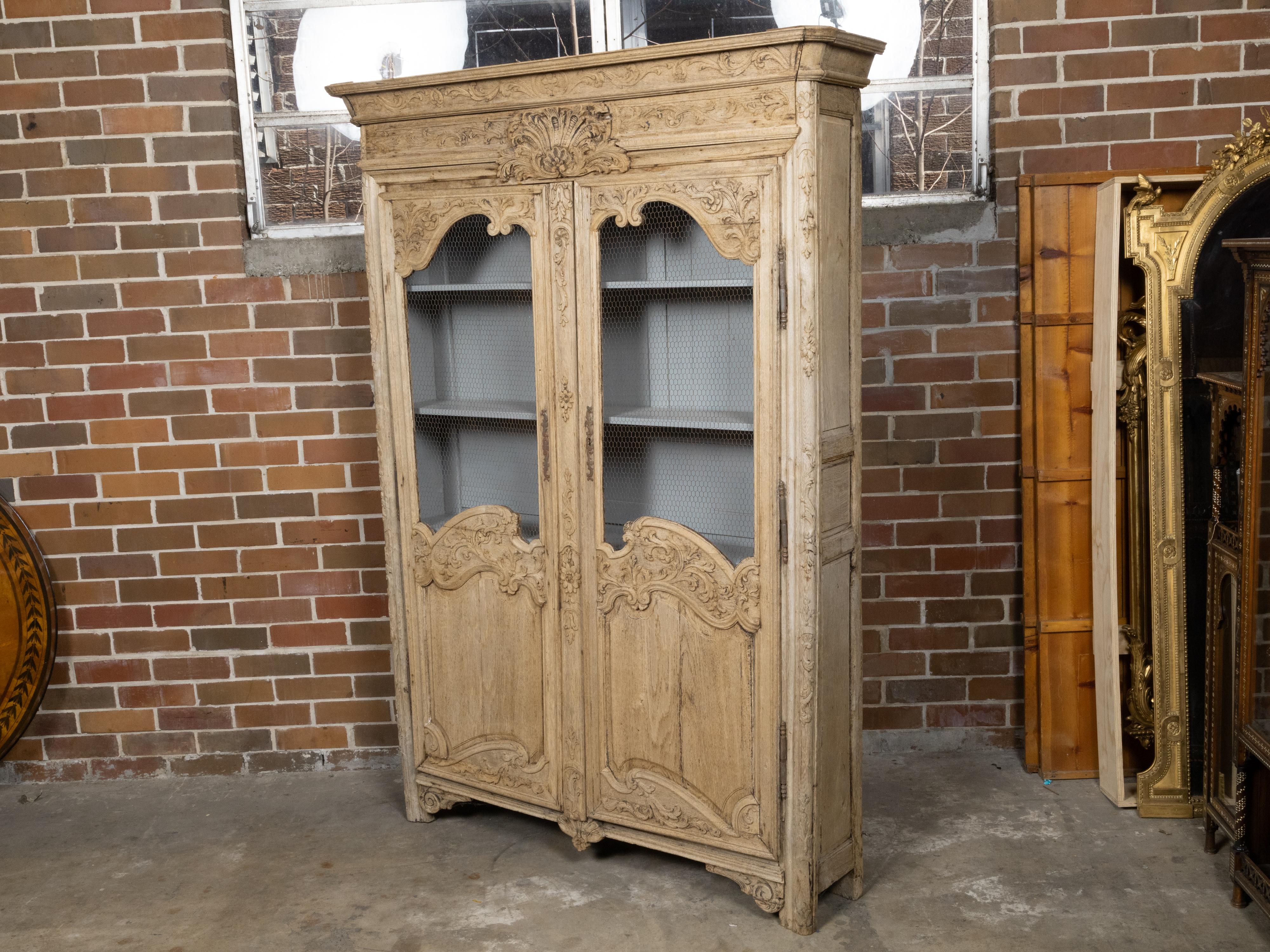 French 19th Century Stripped Wood Bookcase with Carved Scrolling Motifs For Sale 3