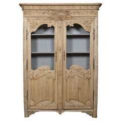 Used French 19th Century Stripped Wood Bookcase with Carved Scrolling Motifs