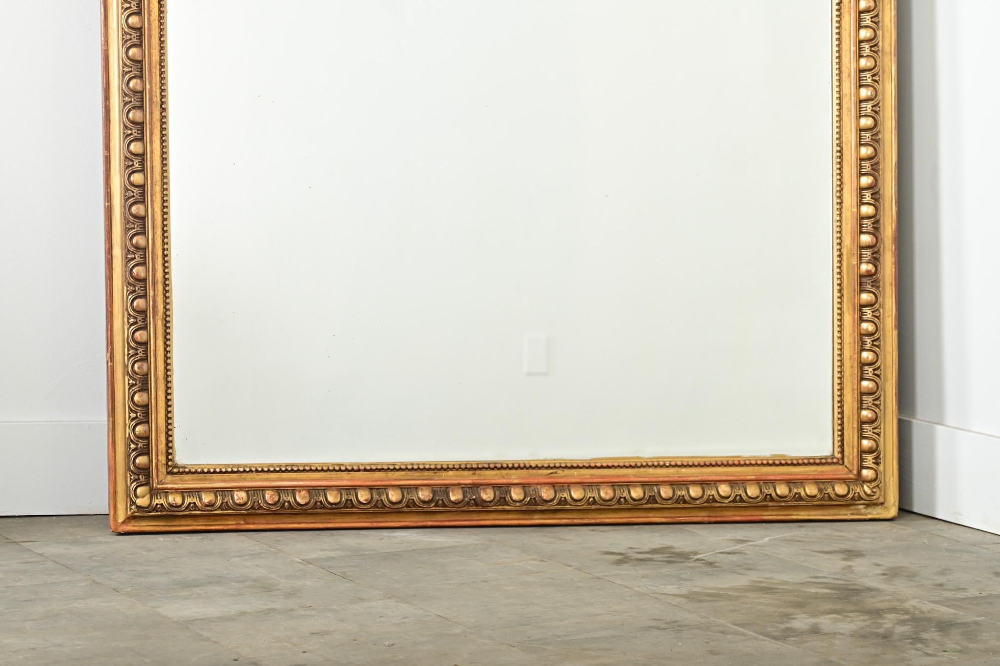 French Provincial French 19th Century Symmetrical Egg & Dart Gilt Mirror For Sale