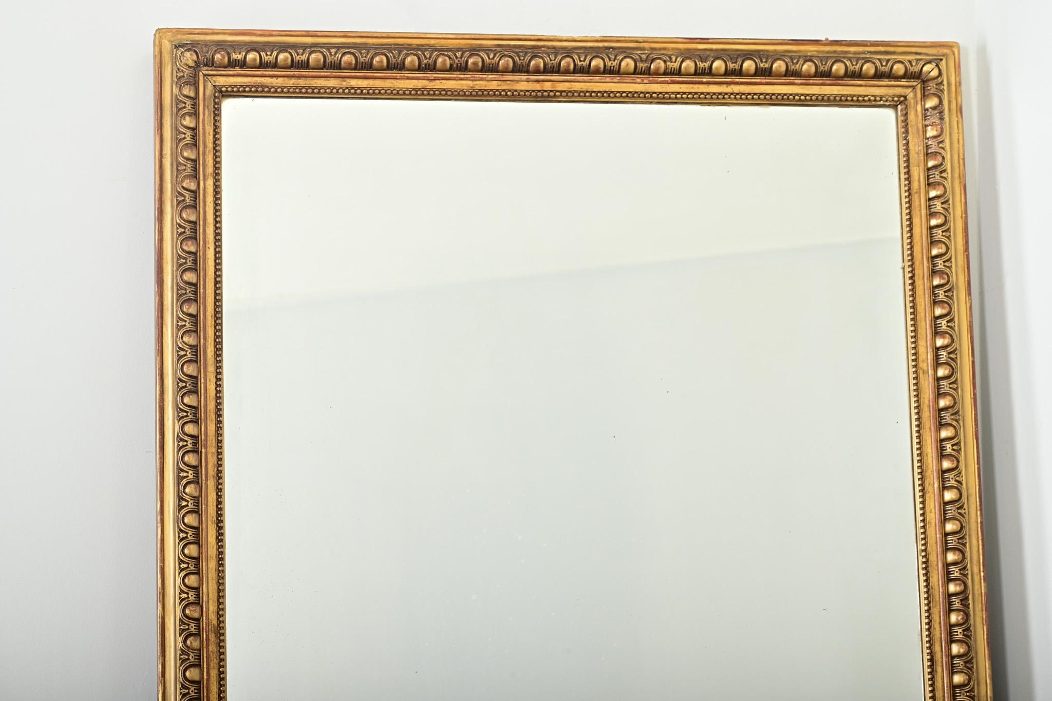 Carved French 19th Century Symmetrical Egg & Dart Gilt Mirror For Sale