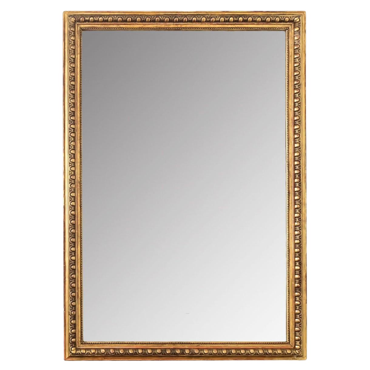 French 19th Century Symmetrical Egg & Dart Gilt Mirror For Sale