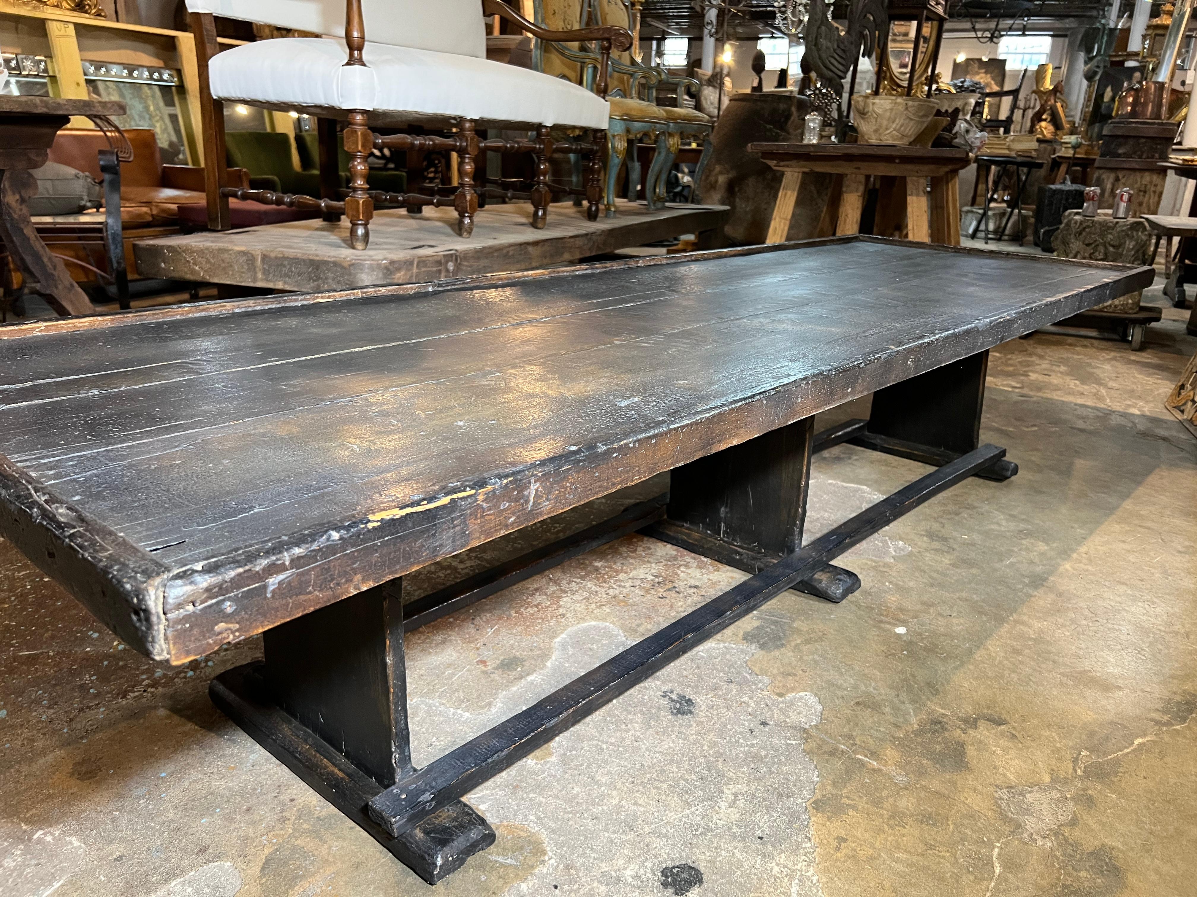A very charming table base, coffee table from the South of France. Soundly constructed from richly painted poplar wood. Great patina - warm and luminous. Perfect for an oversized sofa.