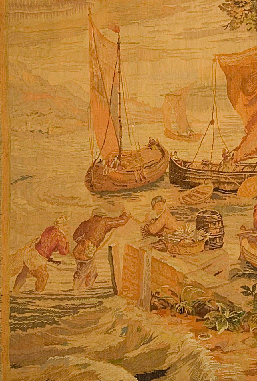 French 19th century tapestry, circa 1890. French 19th century hand-loomed tapestry. An idyllic scene of fisherman and their boats bringing in the catch at the end of the day. Size: 6'6 x 7'3 wide.